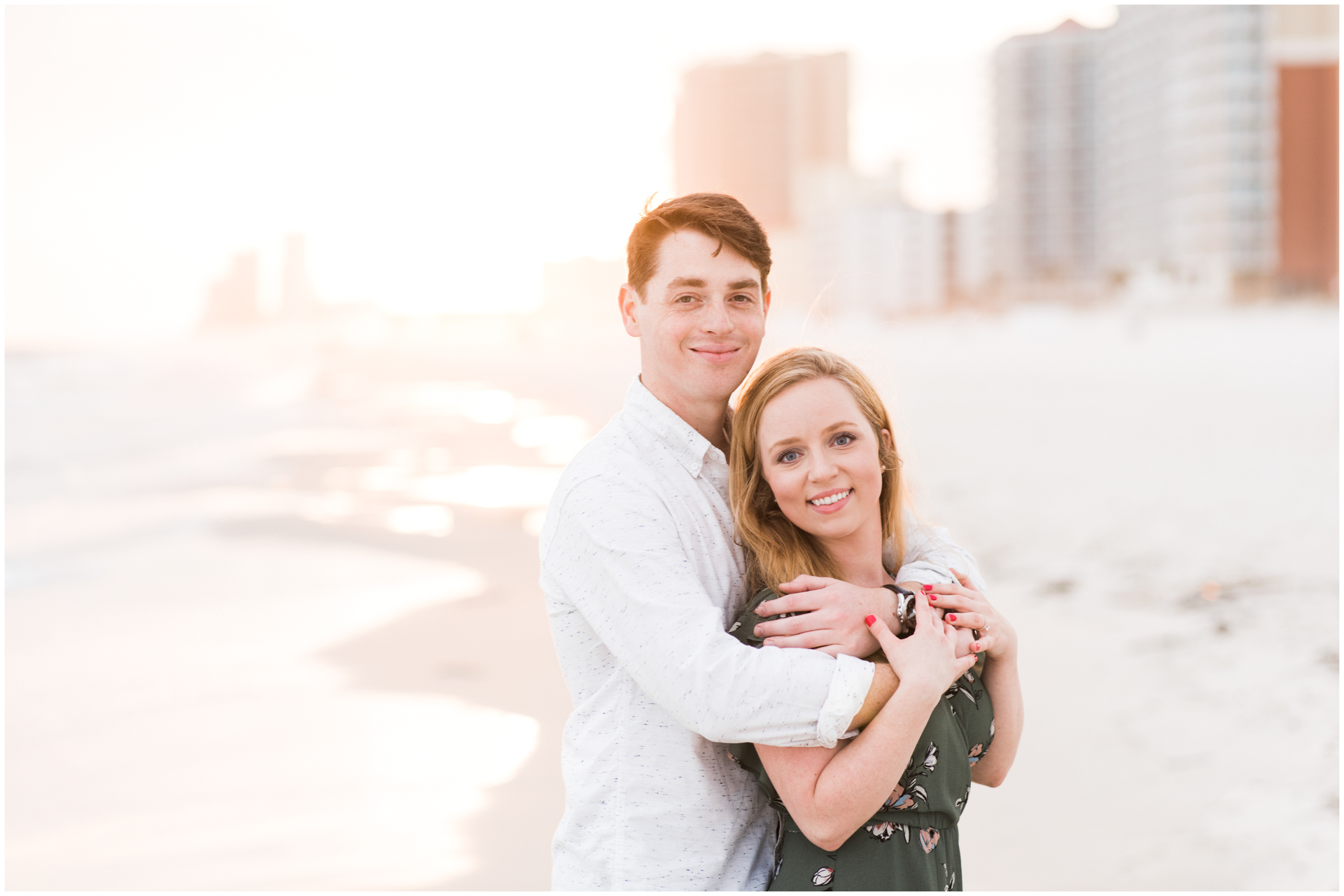 Engagement Session with Gulf Shore Beach skyline in background