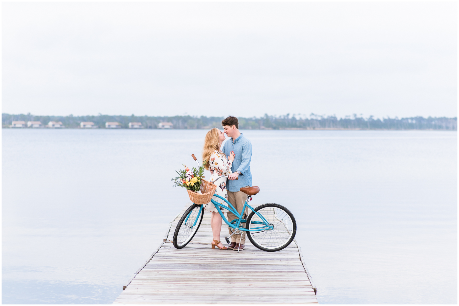 Engagement session on the beach with a bike bicycle