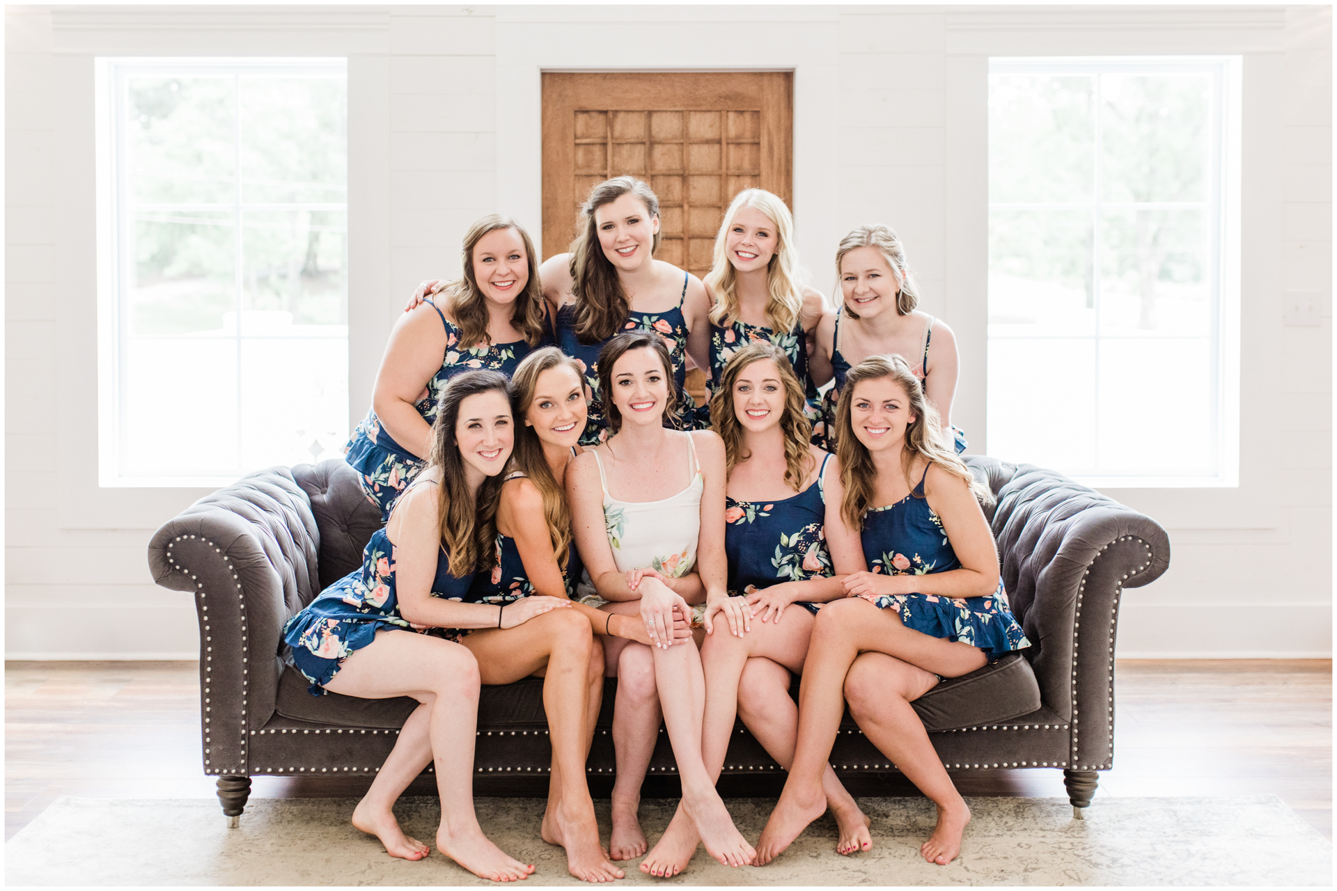 Harvest Hollow Wedding - North Alabama Photography - Bridesmaids on gray couch in pjs