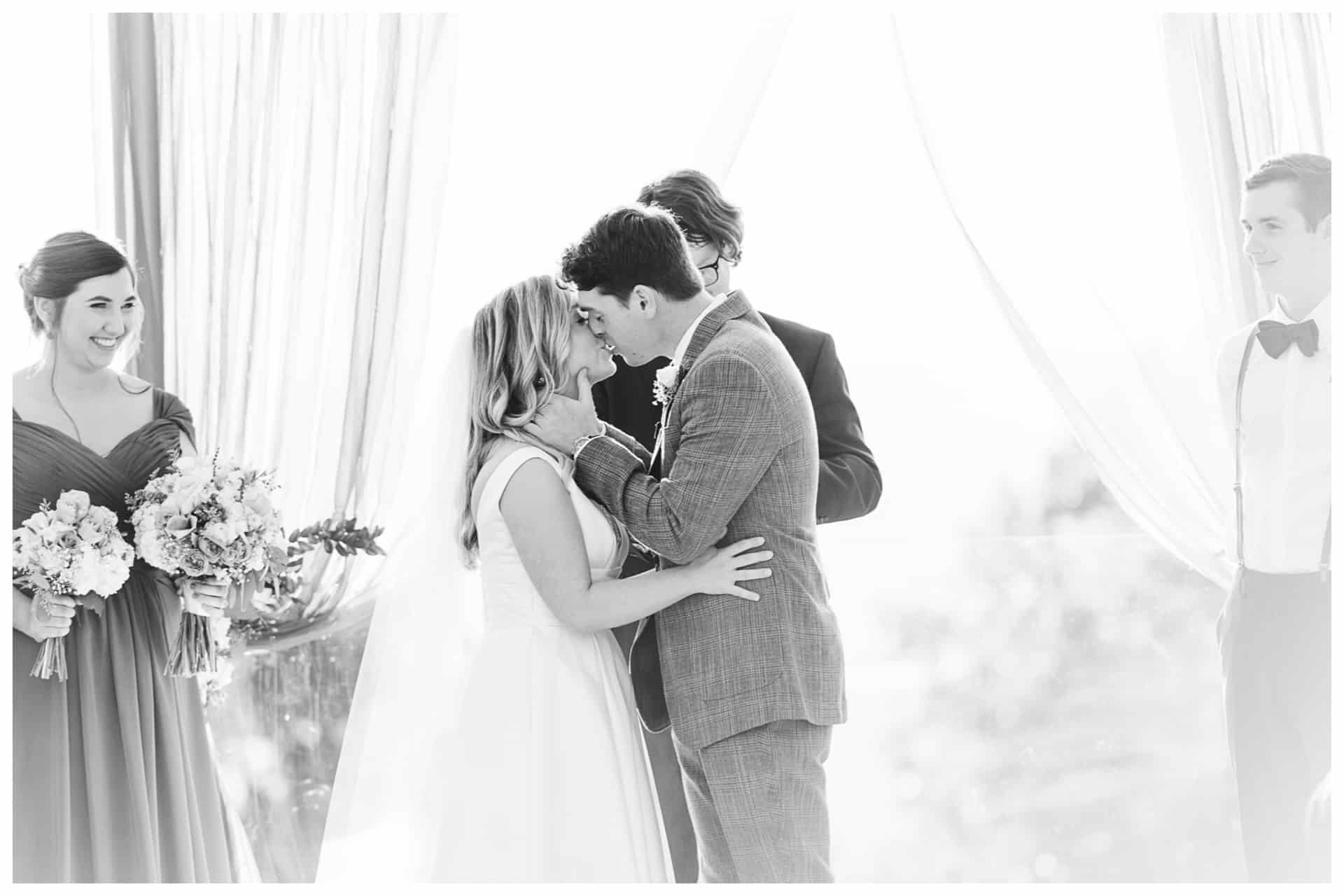 First kiss at the view on baron blue burritt on the mountain wedding Huntsville wedding photographer twenty oaks photography