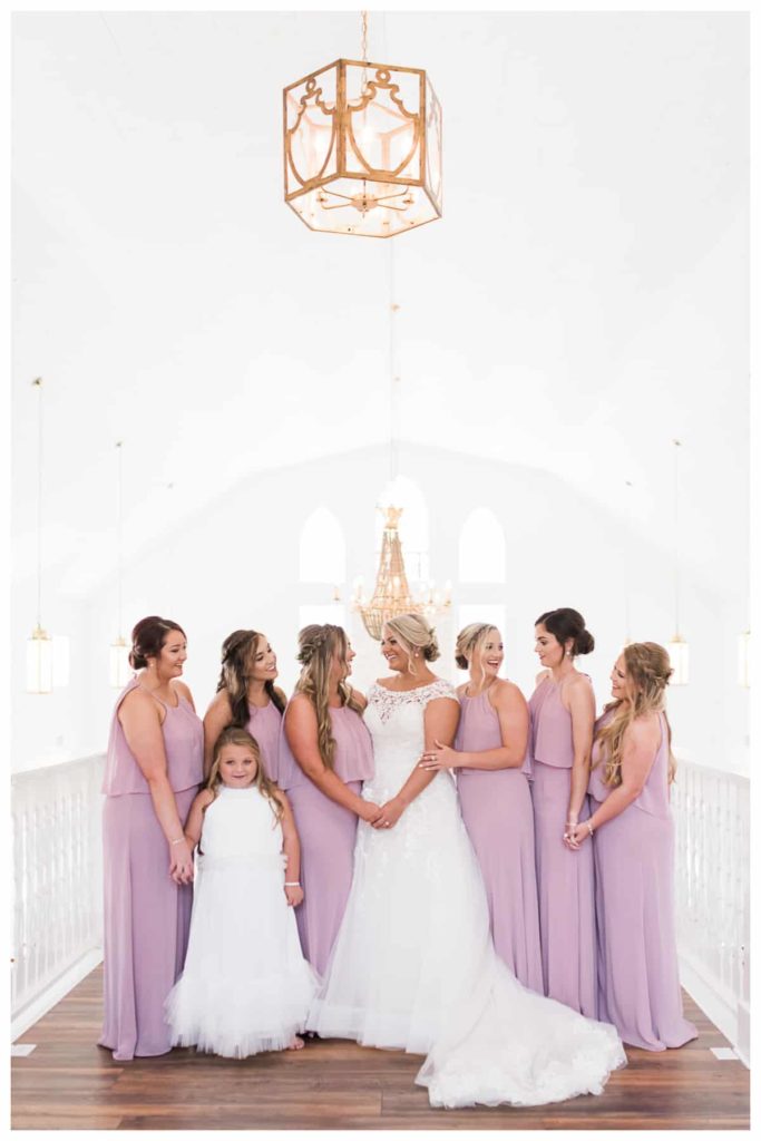Harvest Hollow Venue and Farm - bridesmaids on balcony - dusty pink bridesmaids dress