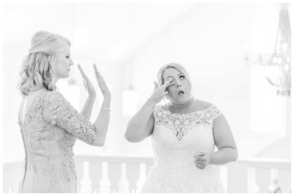 bride-and-her-mother-crying-on-daughters-wedding-day