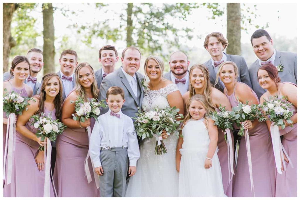 Harvest Hollow Venue and Farm Dusty Rose Bridesmaids dresses - Grey Groomsmen Suits - Fun Bridal Party Photo - Summer Wedding