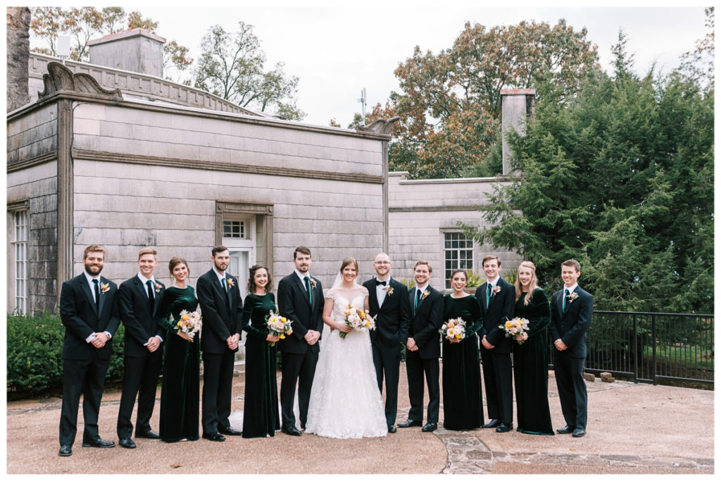 Bridal party on a cloudy day in front of Burritt on the Mountain